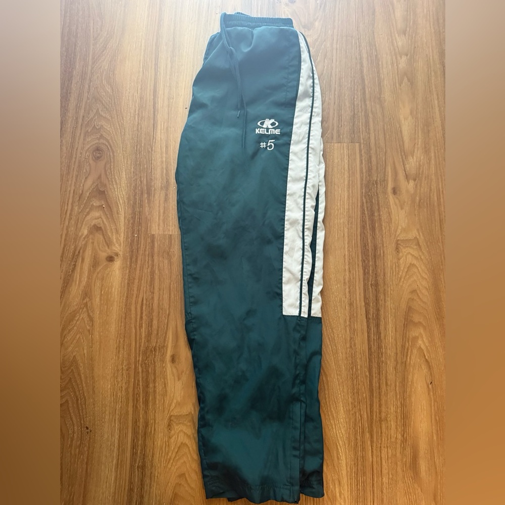 Kelme Green Track Pants with White Stripes